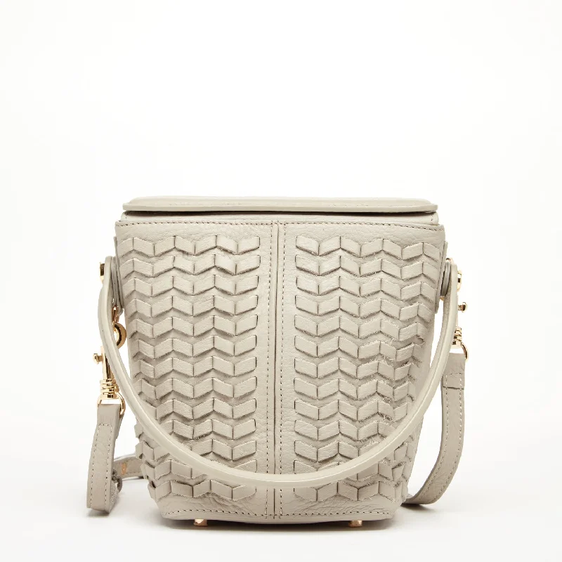 Vintage - style bucket bag with a brass clasp and leather strapsAnna Woven Leather Bag Grayish Beige