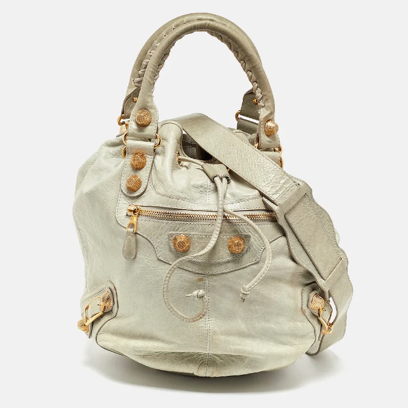 Metallic hobo bag with a shiny finish for evening outingsBalenciaga Light Grey Leather Ggh Pompon Hobo