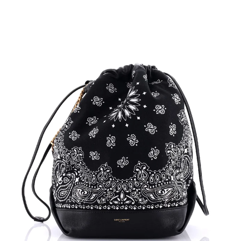 Vintage - style bucket bag with a brass clasp and leather strapsBandana Teddy Bucket Bag Printed Canvas and Leather Small