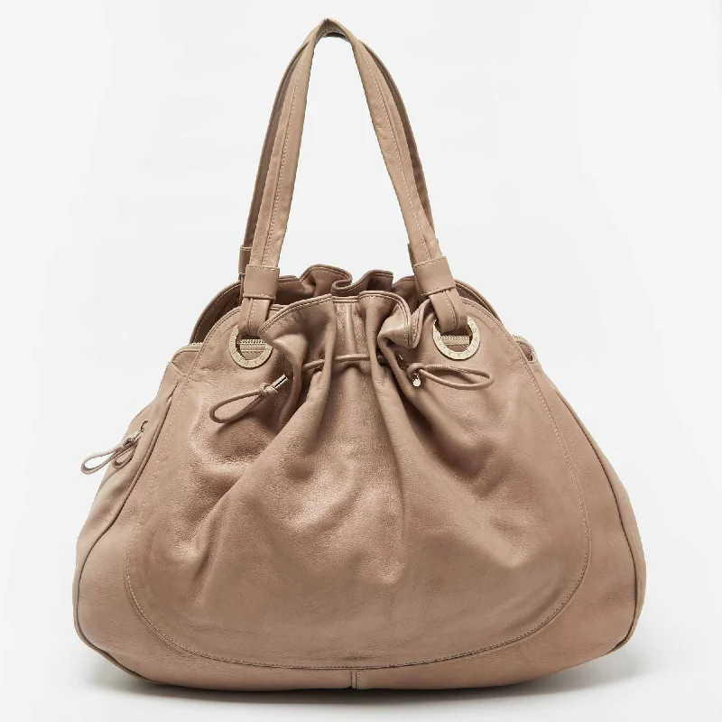 Faux fur hobo bag with a fluffy texture for a winter fashion statementBvlgari Beige Leather Ruched Hobo