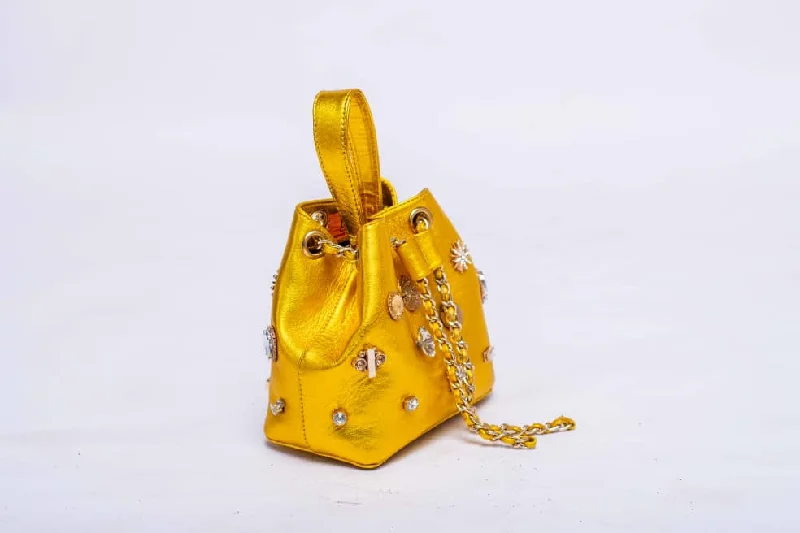 Bucket bag with multiple compartments and pockets for organizationDOT Embellished Yellow Leather Bucket Bag