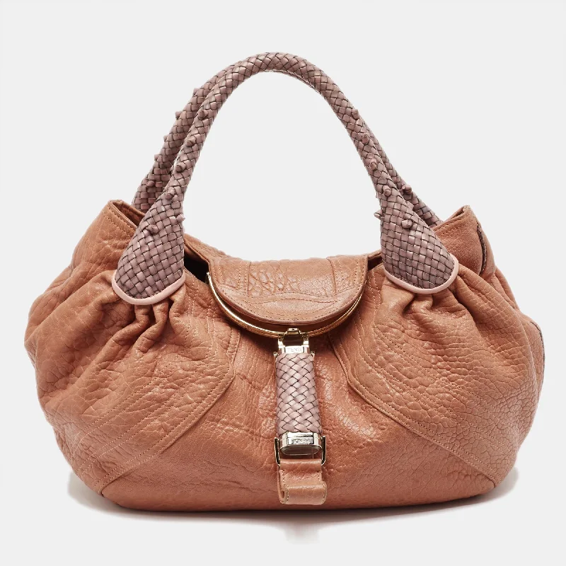 Studded hobo bag with a punk - rock edgeFendi Peach Textured Leather Spy Hobo