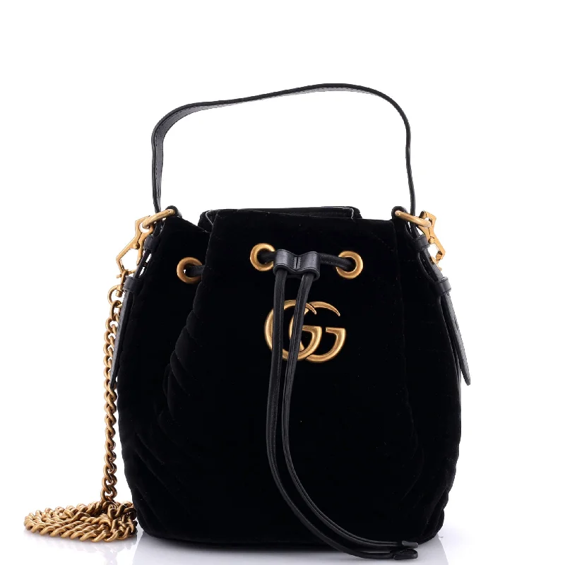 Metallic bucket bag with a shiny finish for evening eventsGG Marmont Bucket Bag Matelasse Velvet Small