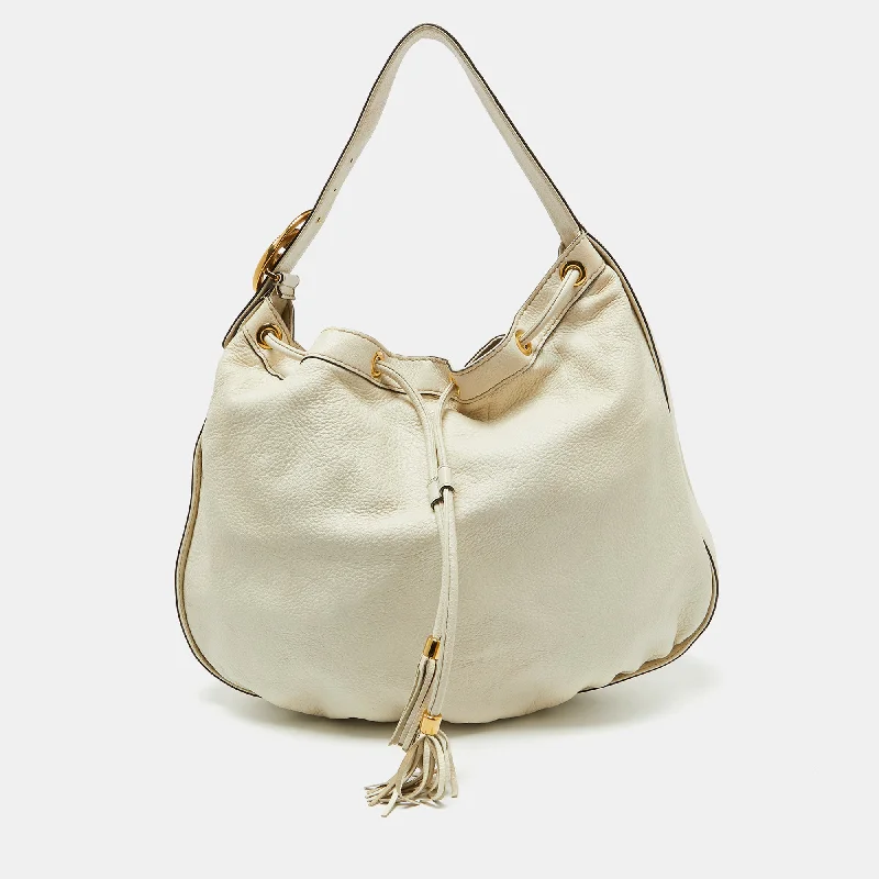 Silk hobo bag with a delicate print for a feminine lookGucci Cream Leather Interlocking Icon Tassel Hobo