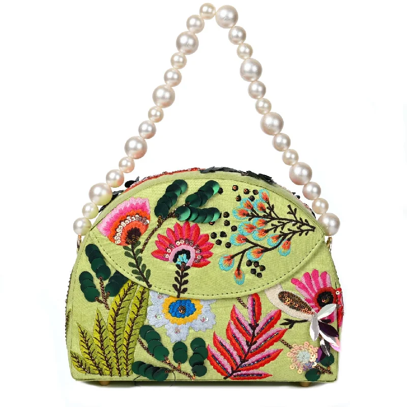 Embroidered bucket bag with colorful threadwork for an ethnic charmIsland Half Moon Bag