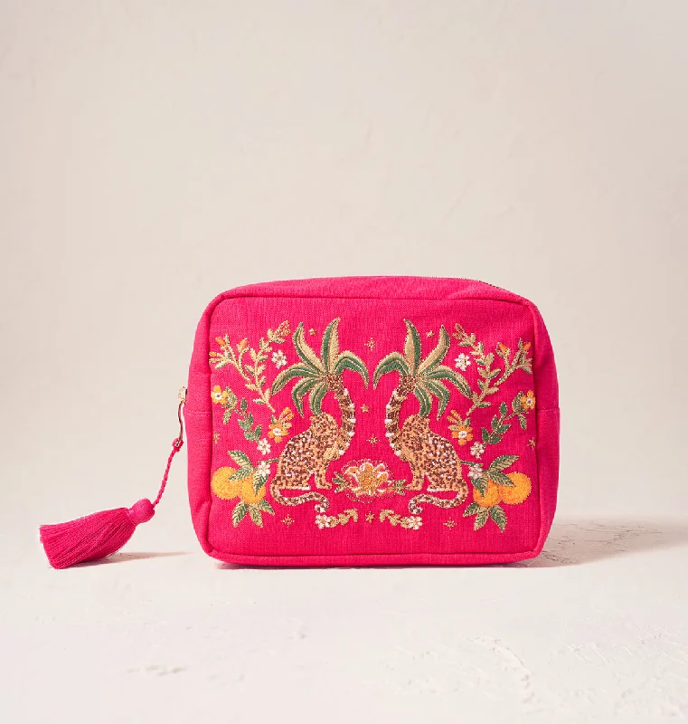 Leatherette makeup bag with a quilted pattern and a magnetic closureTropical Jaguar Wash Bag