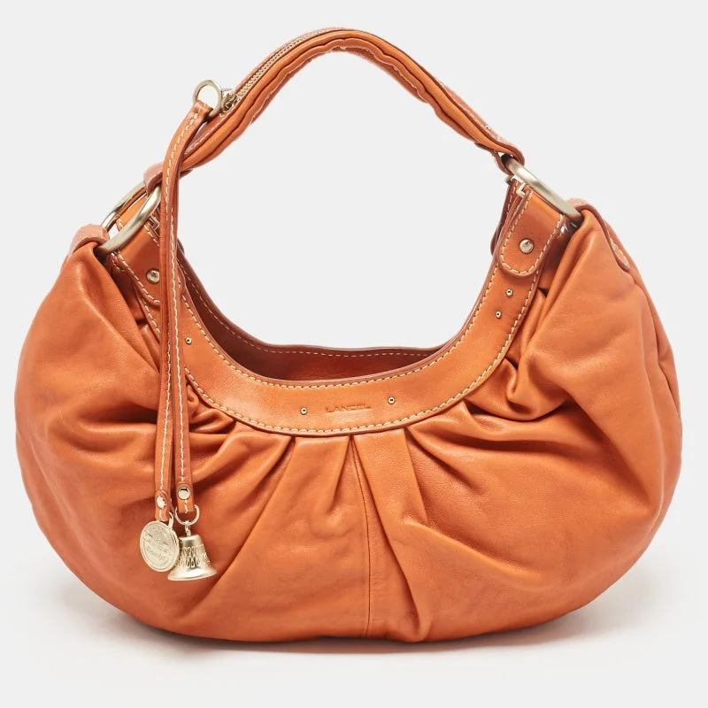 Leatherette hobo bag with a quilted pattern for a sophisticated touchLancel Orange Pleated Leather Bell Hobo