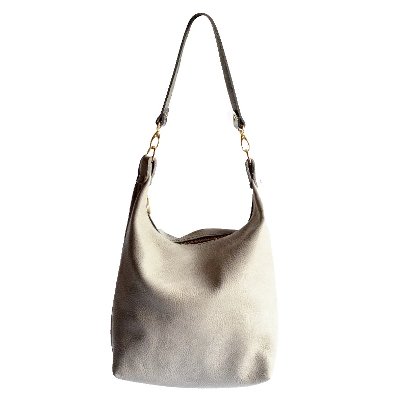 Vintage - style bucket bag with a brass clasp and leather strapsLeather BUCKET Crossbody Bag - Grey Leather