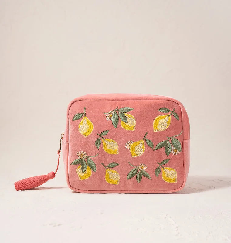 Leatherette makeup bag with a quilted pattern and a magnetic closureLemon Blossom Wash Bag