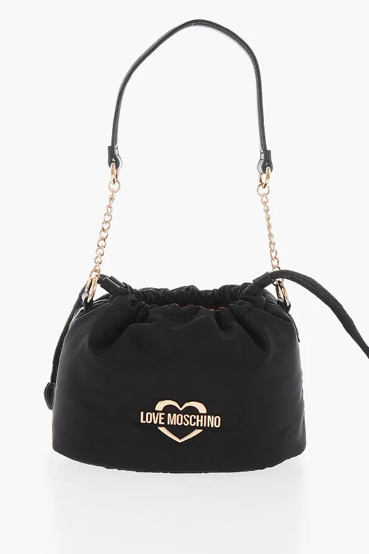 Laser - cut leather bucket bag with an intricate patternMoschino Love Solid Color Mini Bucket Bag With Removable Shoulder Str