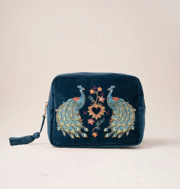 Laser-cut leather makeup bag with an intricate geometric patternPeacock Floral Wash Bag