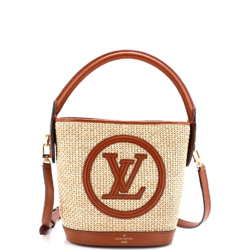 Bucket bag with a hidden anti - theft pocket for securityPetit Bucket NM Bag Raffia with Leather