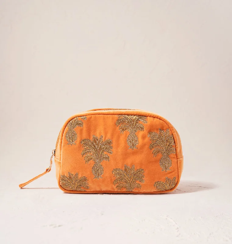 Laser-cut leather makeup bag with an intricate geometric patternPineapple Makeup Bag