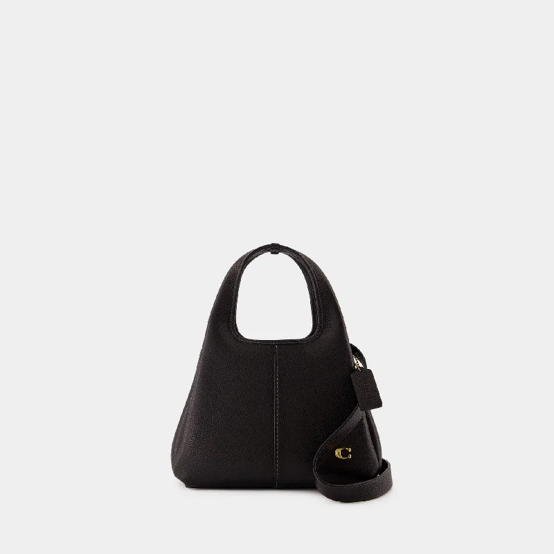 Hobo bag with a magnetic snap closure for easy accessLana 23 Shoulder Bag - Coach - Leather - Black