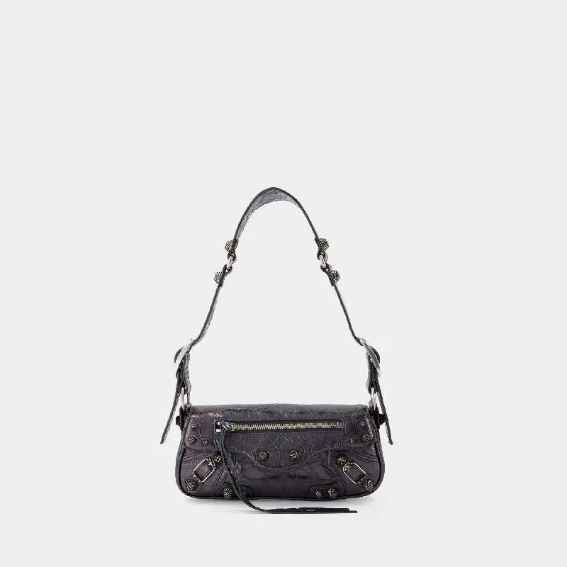 Studded hobo bag with a punk - rock edgeLe Cago Sling Xs Shoulder Bag - Balenciaga - Leather - Grey