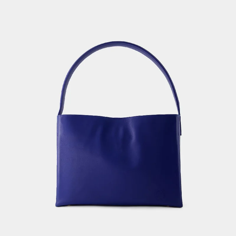 Lightweight nylon hobo bag with a waterproof coating for outdoor useLeonore L Shoulder Bag - Ines de la Fressange - Leather - Blue Cobalt