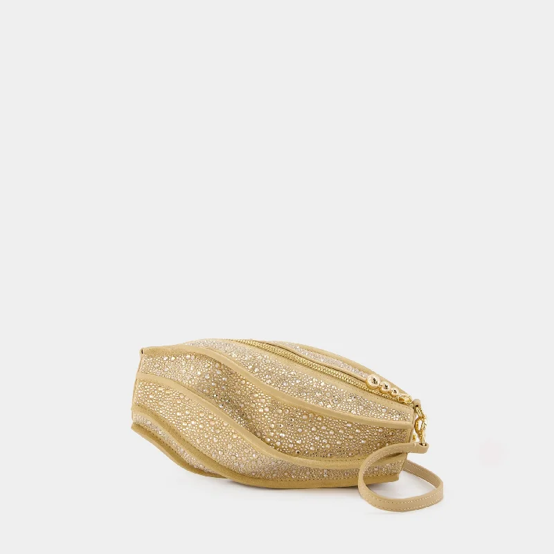 Hobo bag with a tassel - trimmed strap for a playful touchMyrna Shoulder Bag - Cult Gaia - Leather - Gold