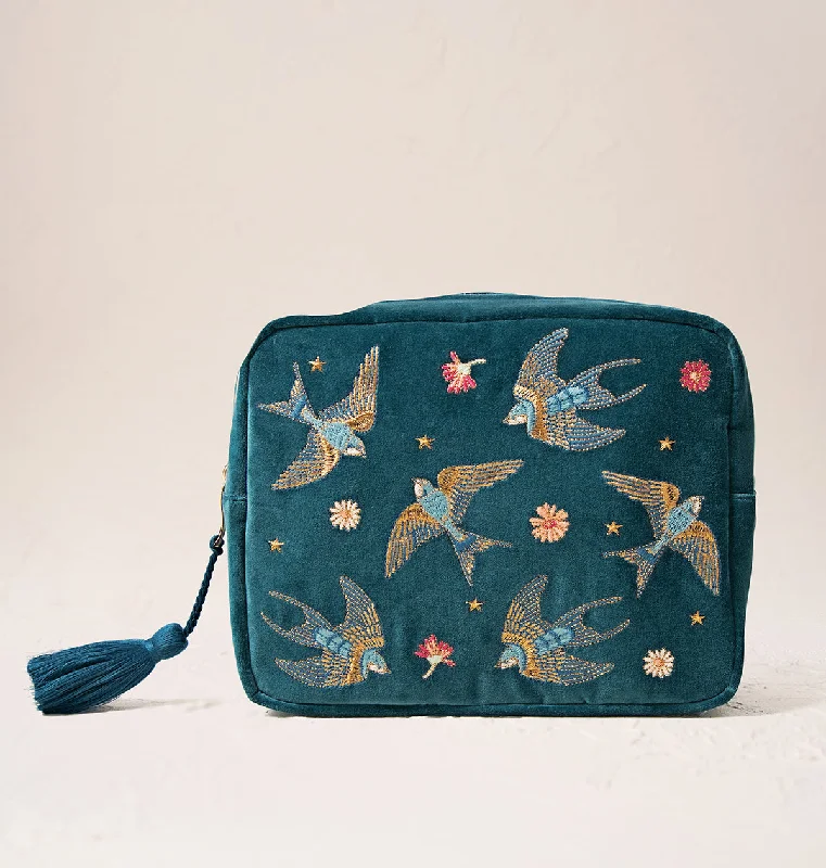 Silk-lined makeup bag with a smooth interior to protect cosmeticsSwallows Wash Bag