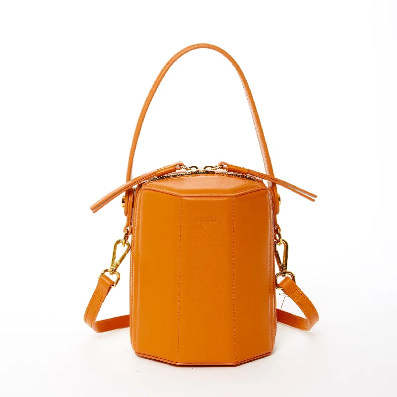 Metallic bucket bag with a shiny finish for evening eventsHarper Orange Leather Bucket Bag