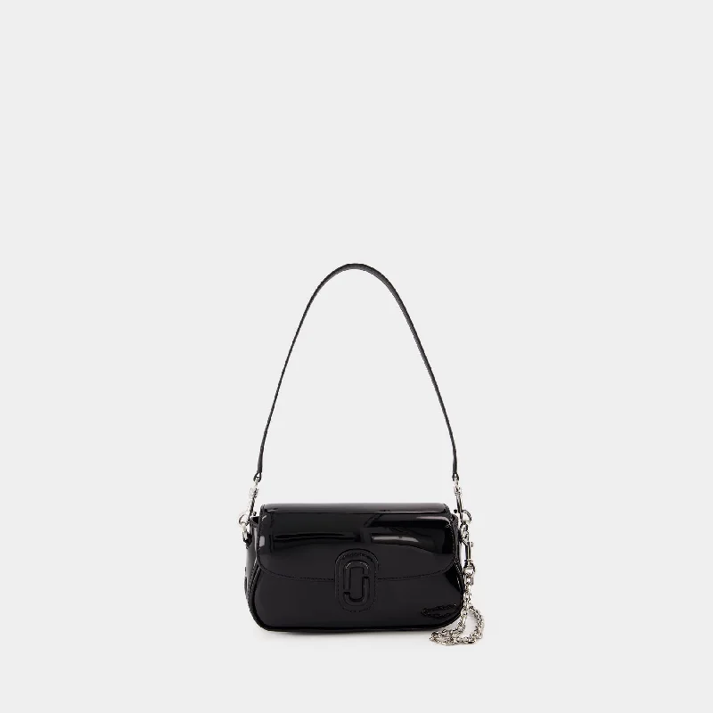 Faux fur hobo bag with a fluffy texture for a winter fashion statementThe Small Shoulder Bag - Marc Jacobs - Leather - Black