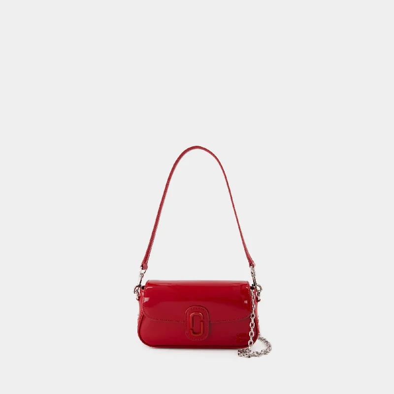 Vintage - inspired hobo bag with a brass frame and tassel detailsThe Small Shoulder Bag - Marc Jacobs - Leather - Red