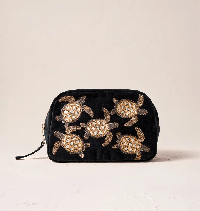 Studded makeup bag with a punk-rock edgeTurtle Conservation Makeup Bag