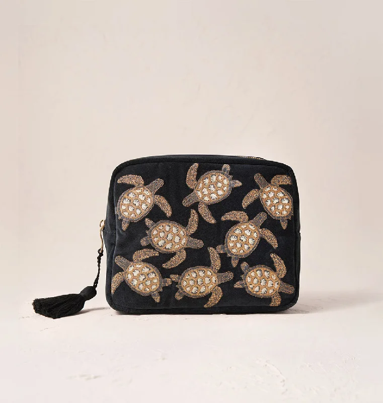 Makeup bag with a tassel or fringe detail for a bohemian vibeTurtle Conservation Wash Bag