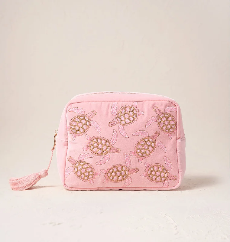 Faux fur makeup bag with a fluffy exterior for a winter aestheticTurtle Conservation Wash Bag