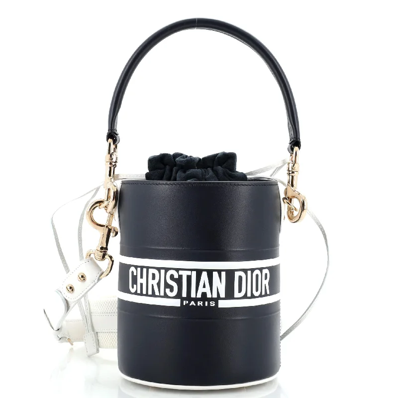 Vintage - style bucket bag with a brass clasp and leather strapsVibe Drawstring Bucket Bag Leather Small