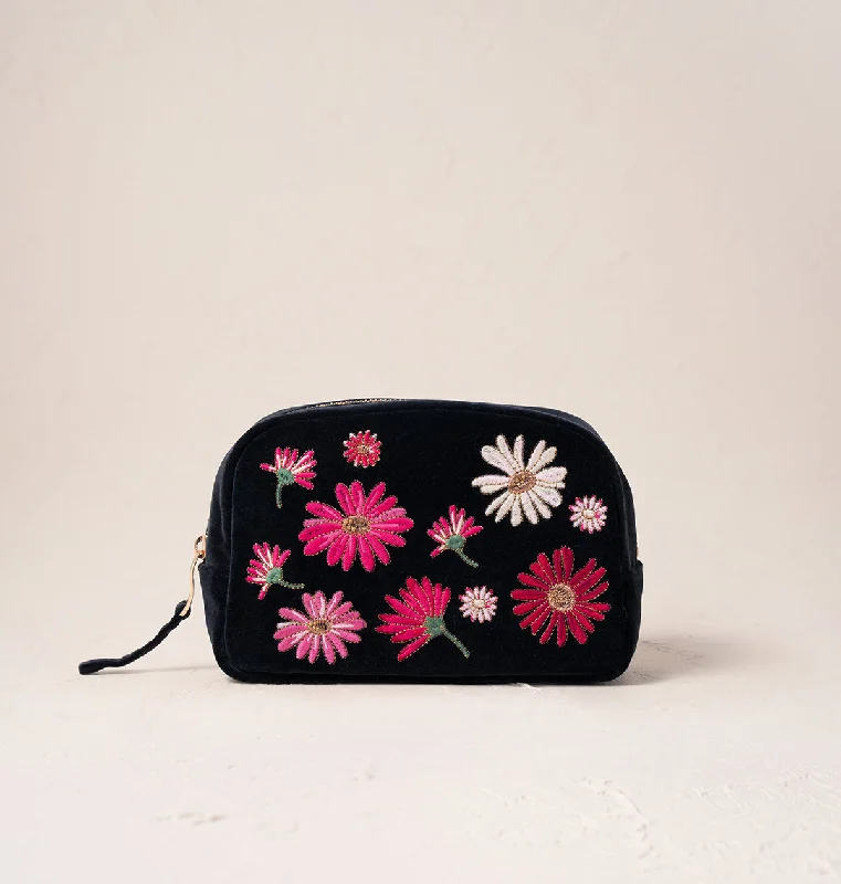 Leatherette makeup bag with a quilted pattern and a magnetic closureWildflower Makeup Bag