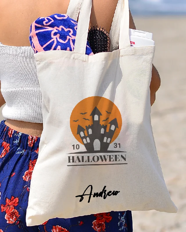 Tote bag with multiple internal compartments and a zippered pocket for organizationHaunted Castle - Halloween Tote Bags