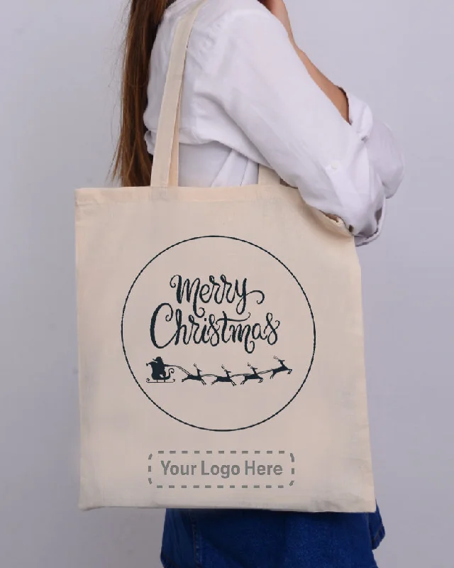 Women's leather tote bag with hand-stitched details and gold hardware for luxurySanta Claus With a Reindeer Flying Christmas Tote Bag - Christmas Bags