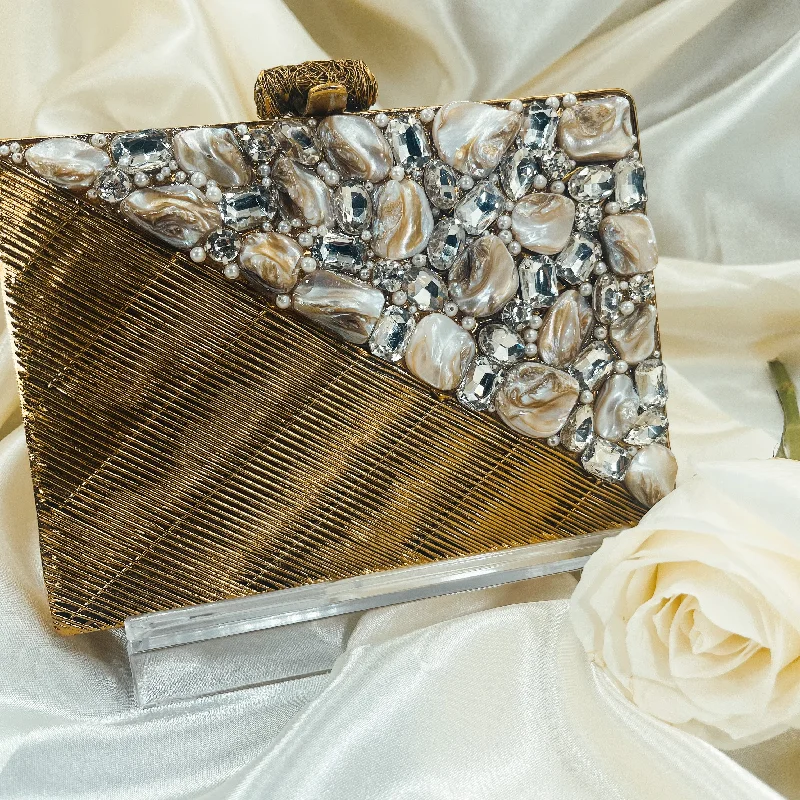 Velvet clutch with a tassel detail for a bohemian - chic styleANUSHKA Clutch