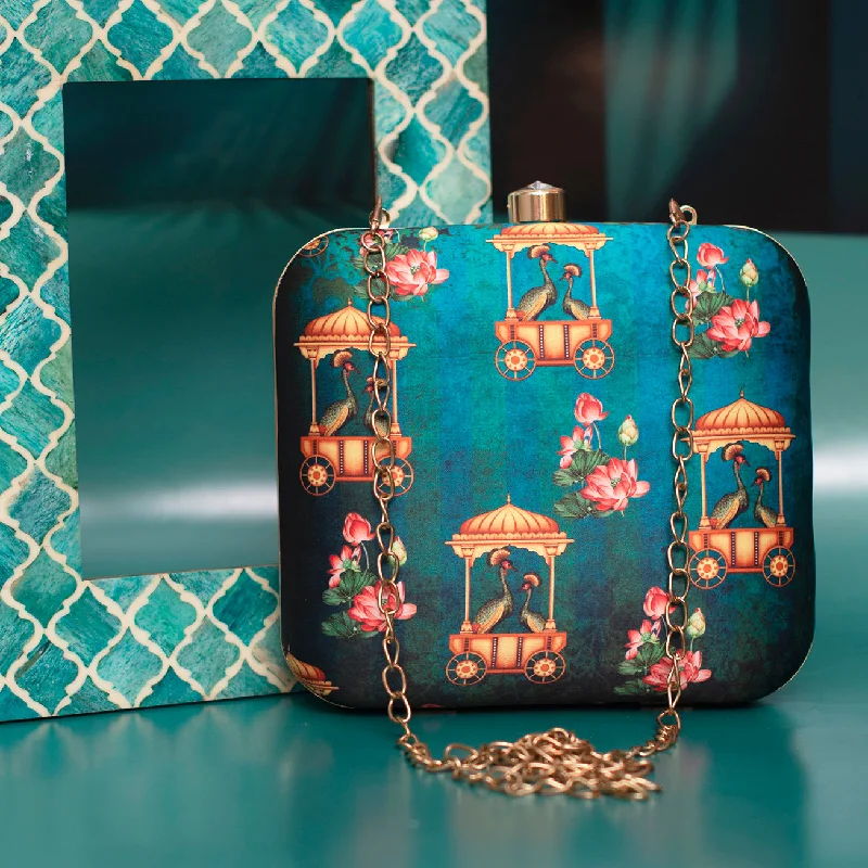 Velvet clutch with a tassel detail for a bohemian - chic styleBlue Aesthetic Printed Clutch