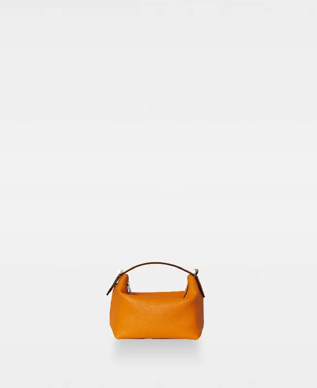 Patent leather handle bag in a bright red color for a bold fashion statementCALLY box bag - Apricot Orange