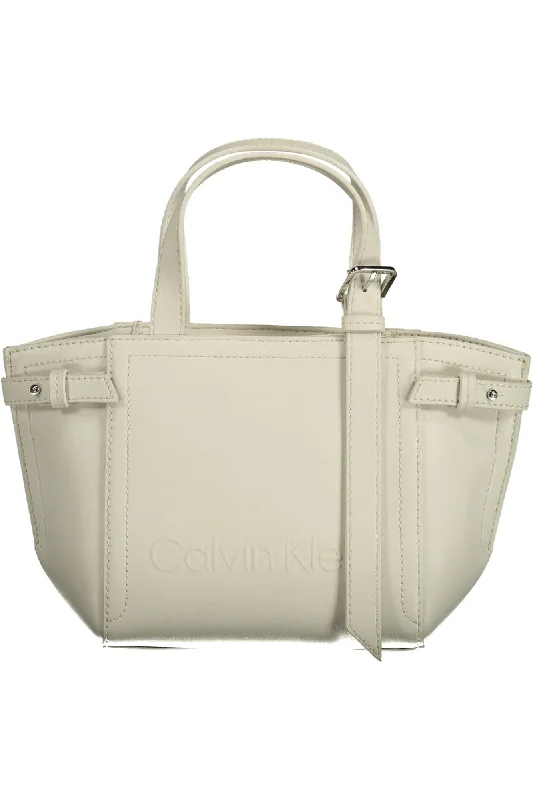 Convertible satchel that can be worn as a crossbody or shoulder bagCalvin Klein Sleek  Double Handle Satchel Women's Bag