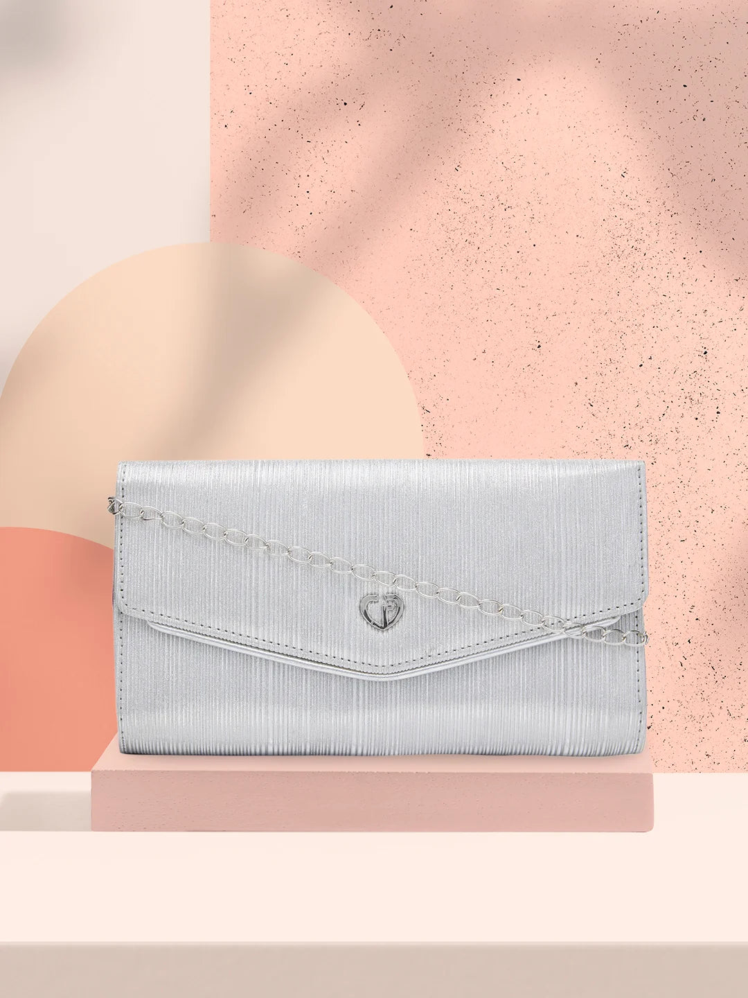 Mother - of - pearl clutch with a delicate sheenCaprese Eryka Clutch Large Silver