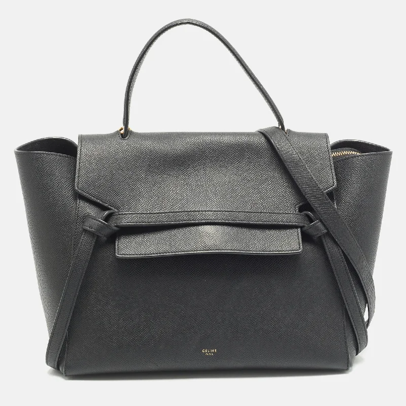 Convertible satchel that can be worn as a crossbody or shoulder bagCeline Black Leather Micro Belt Top Handle Bag..