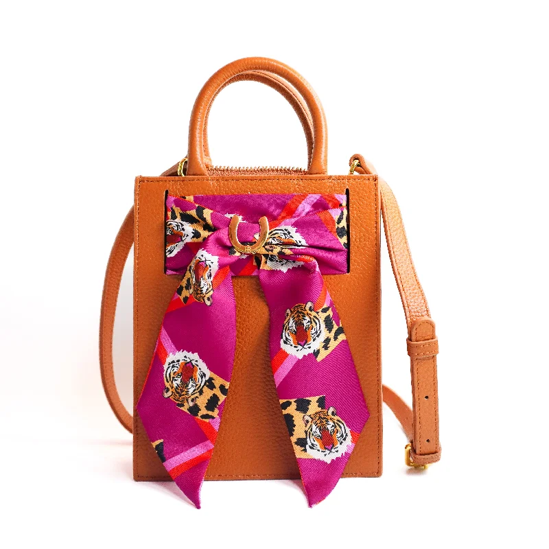 Silk - lined handle bag with a smooth interior to protect belongingsLeather Mini Calista + Fuscia Easy Tiger Twilly