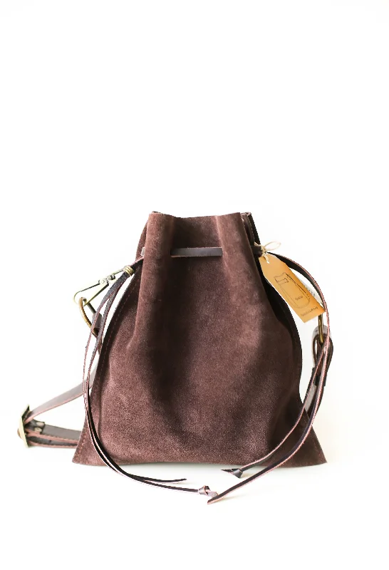 Vintage - style crossbody bag with a brass frame and leather strapsDark Brown Suede Cross Body Bag