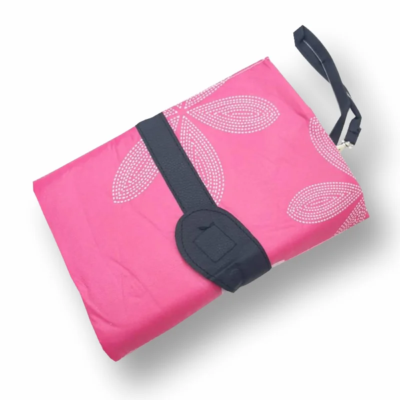 Two - tone clutch with a contrast color lining for added styleChieea Diaper Changing Clutch - Pink