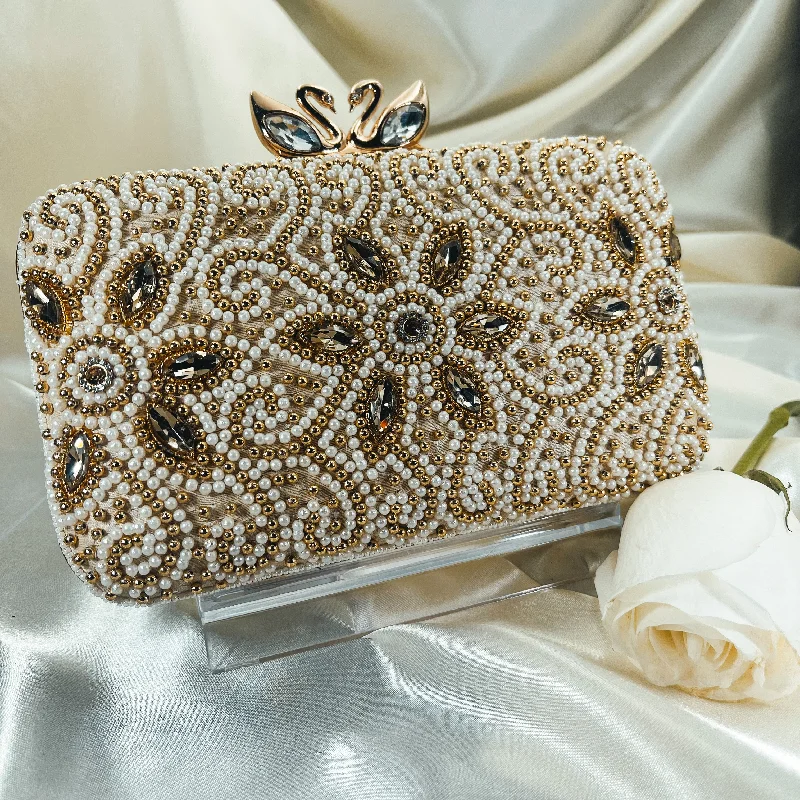 Laser - cut leather evening bag with an intricate patternDISHA Clutch (Ivory)