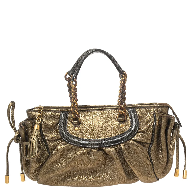 Laser-cut leather satchel with an intricate geometric designDolce & Gabbana  Olive Leather Tassel Satchel