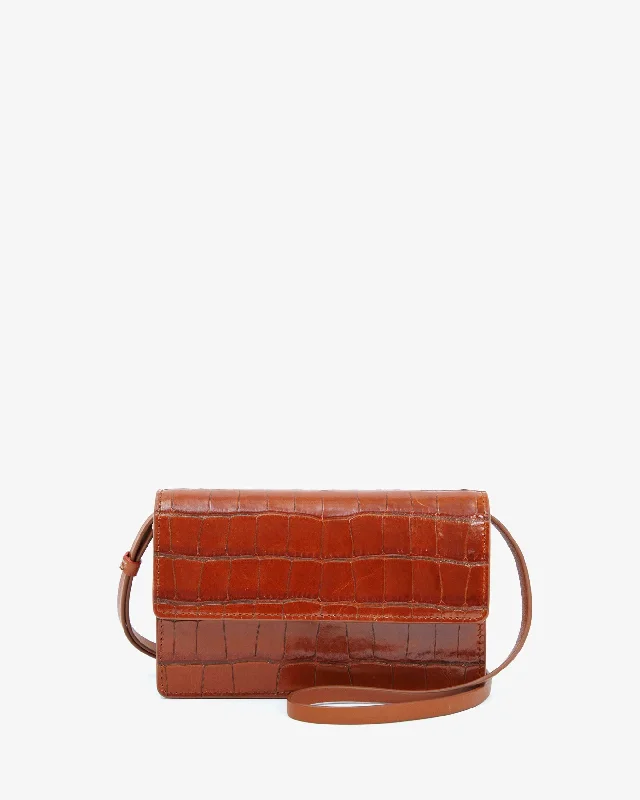 Crossbody bag with a magnetic snap closure for quick accessFête Pochette