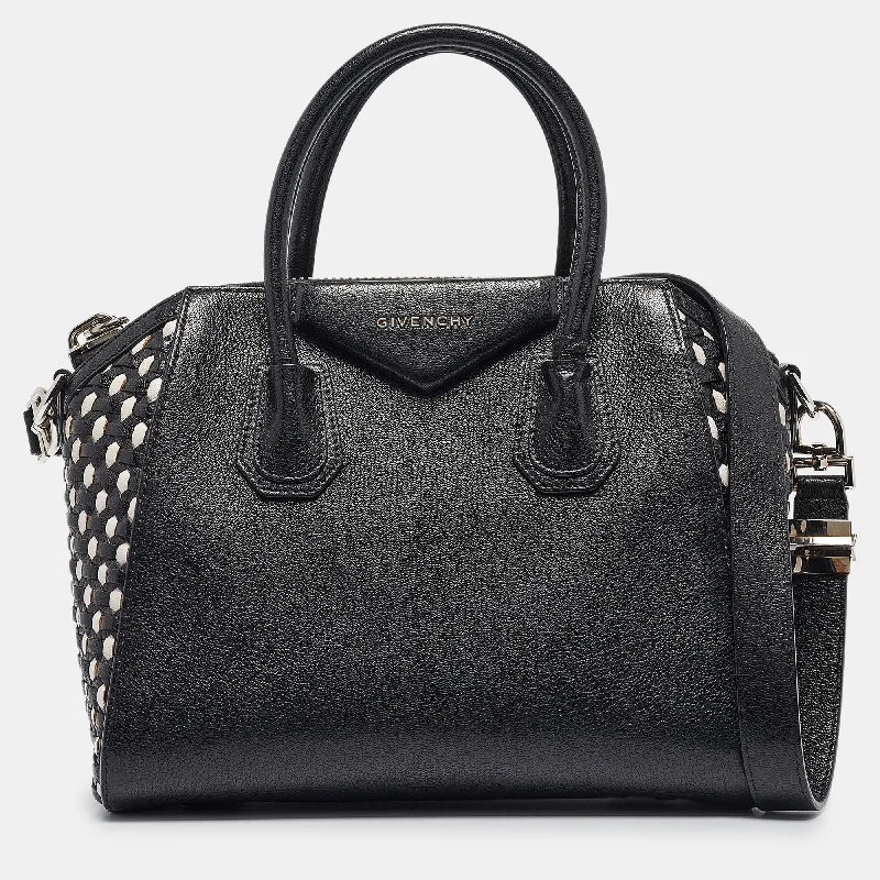 Faux fur satchel with a fluffy exterior for a winter fashion statementGivenchy Black/white Leather Small Woven Antigona Satchel