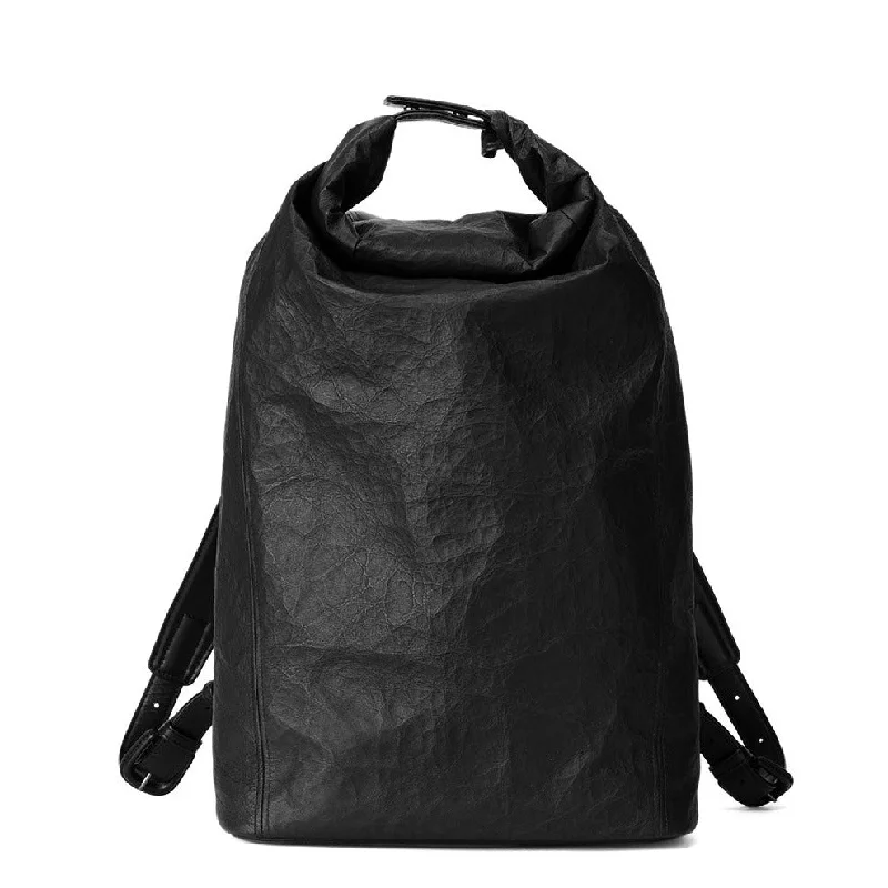 Vintage - style leather handle bag with a structured silhouette and a tassel charmRolltop Backpack