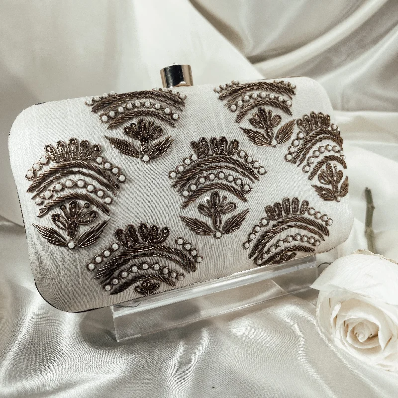 Embroidered silk clutch with a traditional motif for a cultural touchKIARA Clutch (Ivory)