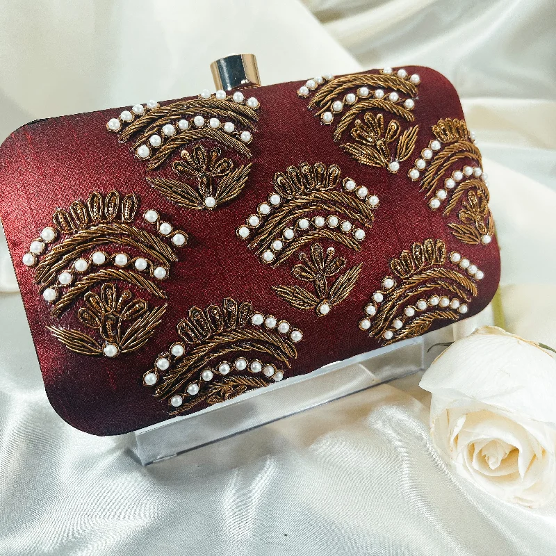 Embroidered silk clutch with a traditional motif for a cultural touchKIARA Clutch (Red)