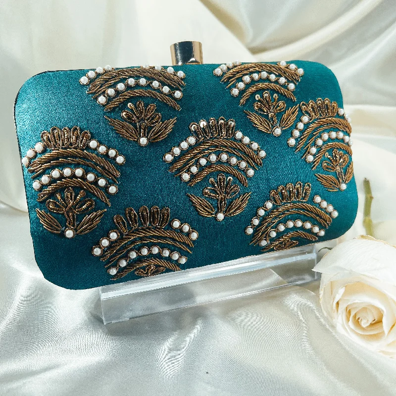 Laser - cut leather evening bag with an intricate patternKIARA Clutch (Teal)