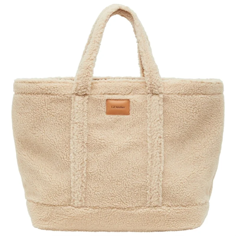 Soft suede shoulder bag in a warm camel color for autumn eleganceLil'Atelier White Pepper Danco Mom Shoulder Bag